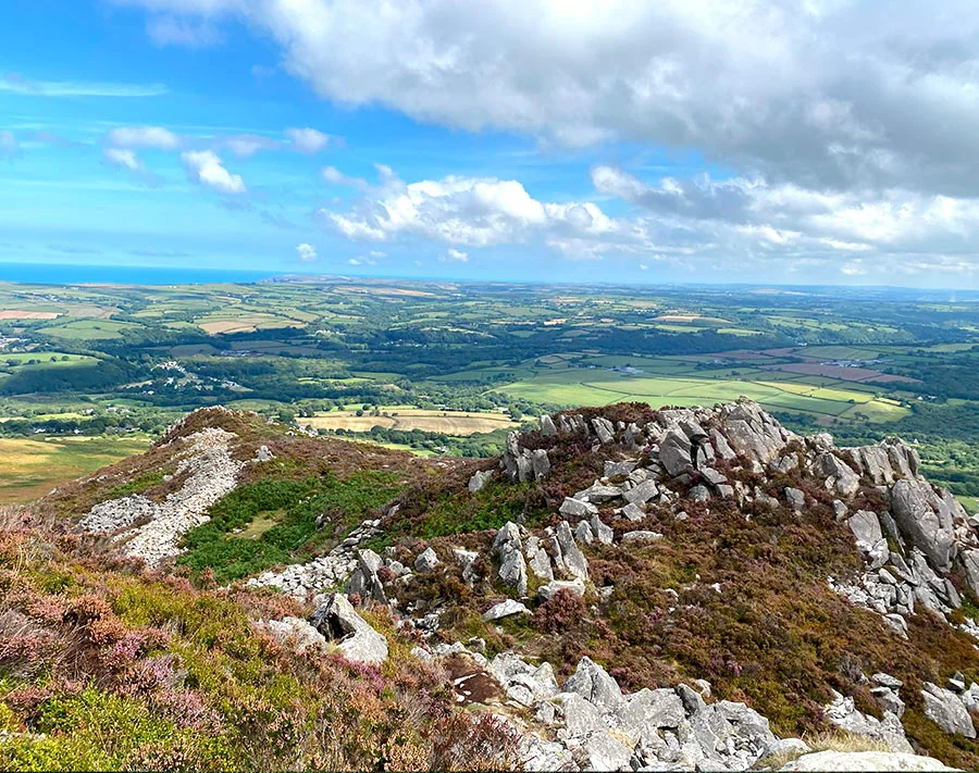 The majestic Carningli Mountain in Pembrokeshire under a clear sky.