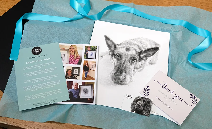 Kegan's portrait securely wrapped in packaging, ready for opening.