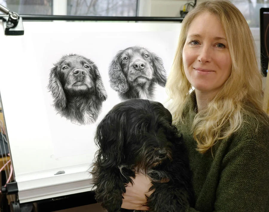 Melanie Phillips pet portrait artist with her dog Lily in her studio.