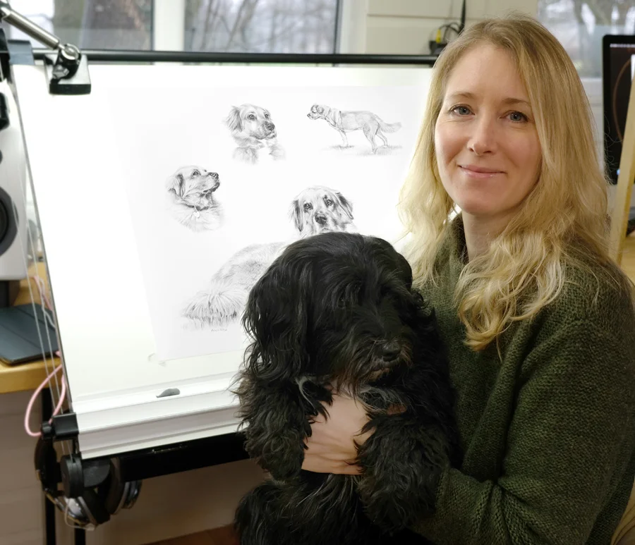 Melanie working diligently at her art desk.