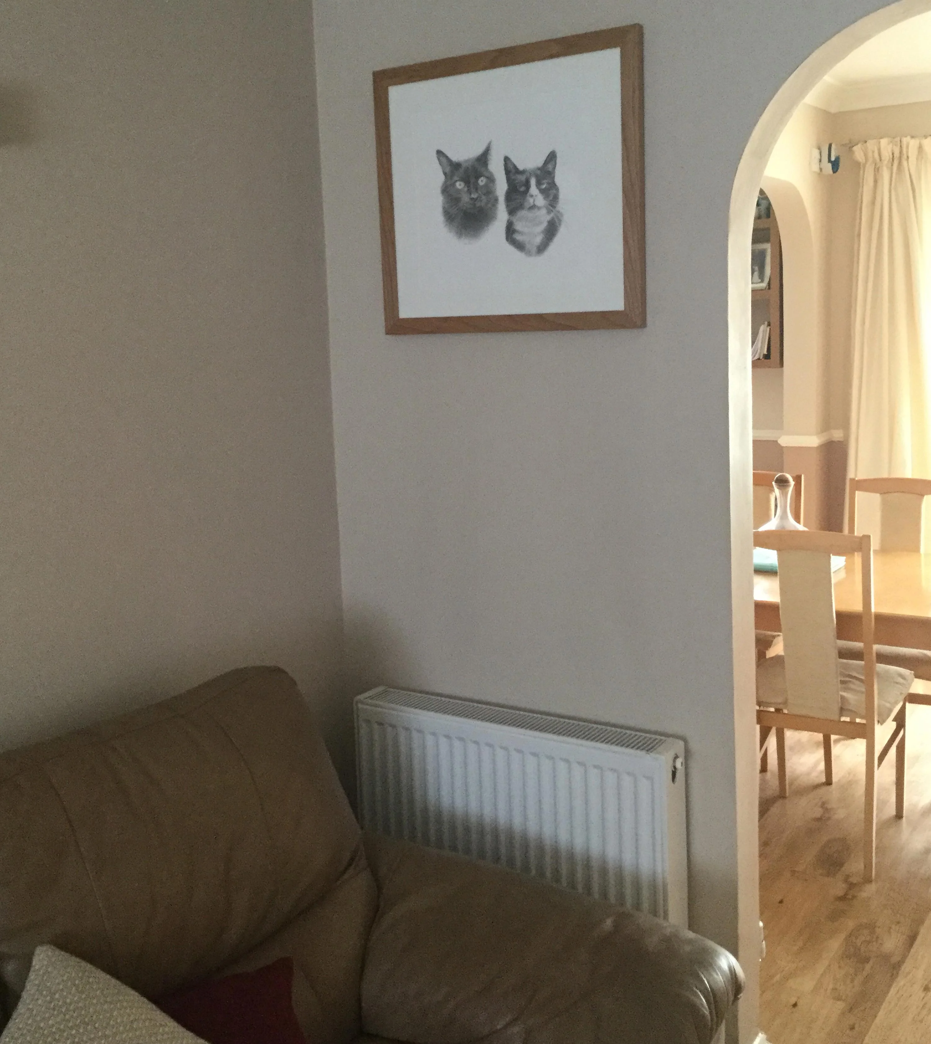 High-resolution scan of the double cat pencil portrait of Pixie and Boots, showing fine details.